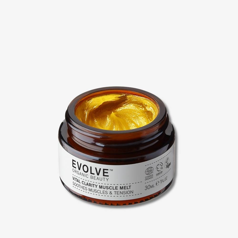 Open jar of Evolve Vital Clarity balm on a plain background